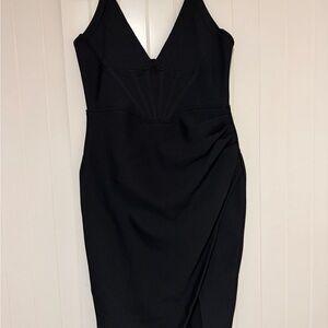 Black bodycon dress with slit
